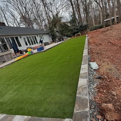 Artificial Turf with Paver Border project by Andrew's Landscaping in the Charlotte NC area