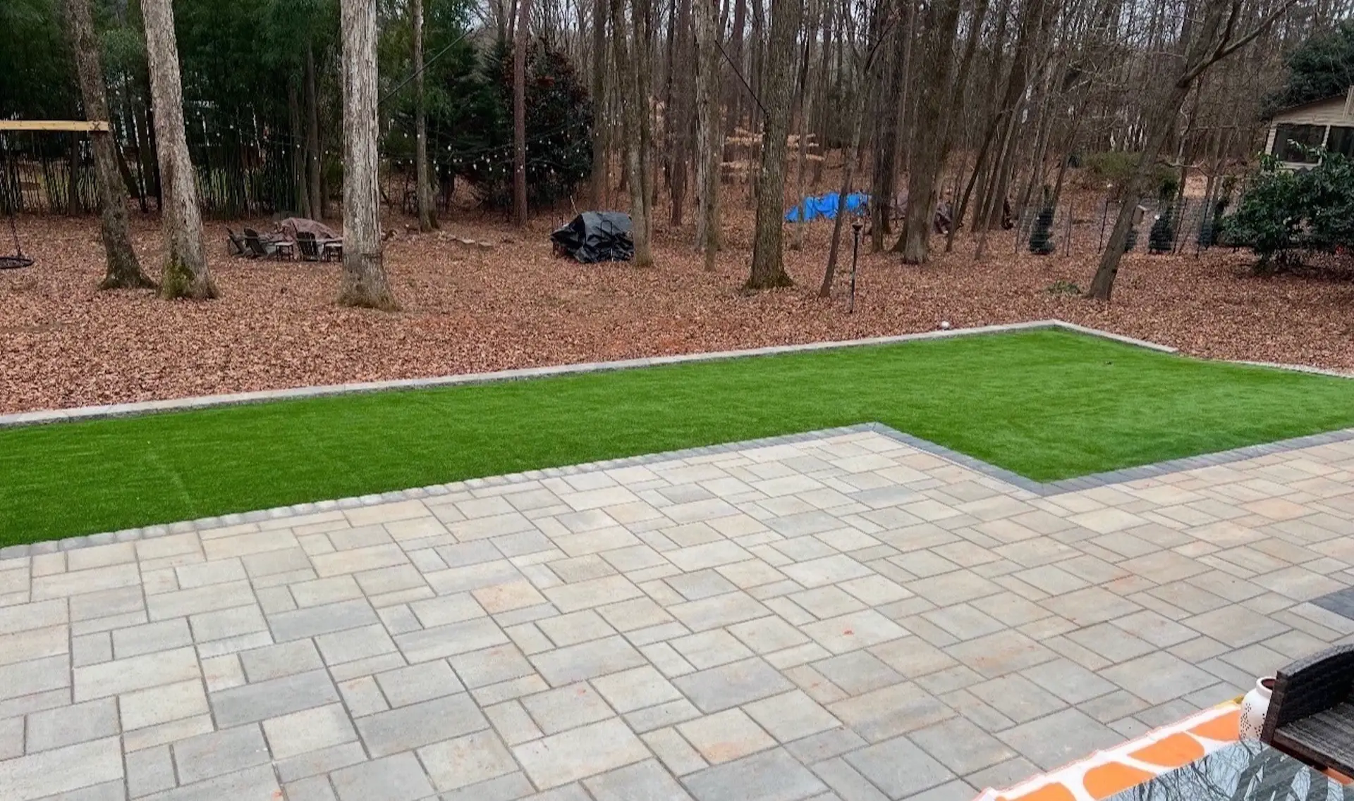 Patio & Turf project by Andrew's Landscaping in the Charlotte NC area