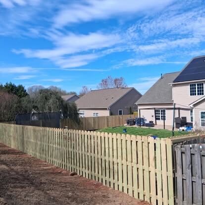 Wood Picket Fence project by Andrew's Landscaping in the Charlotte NC area